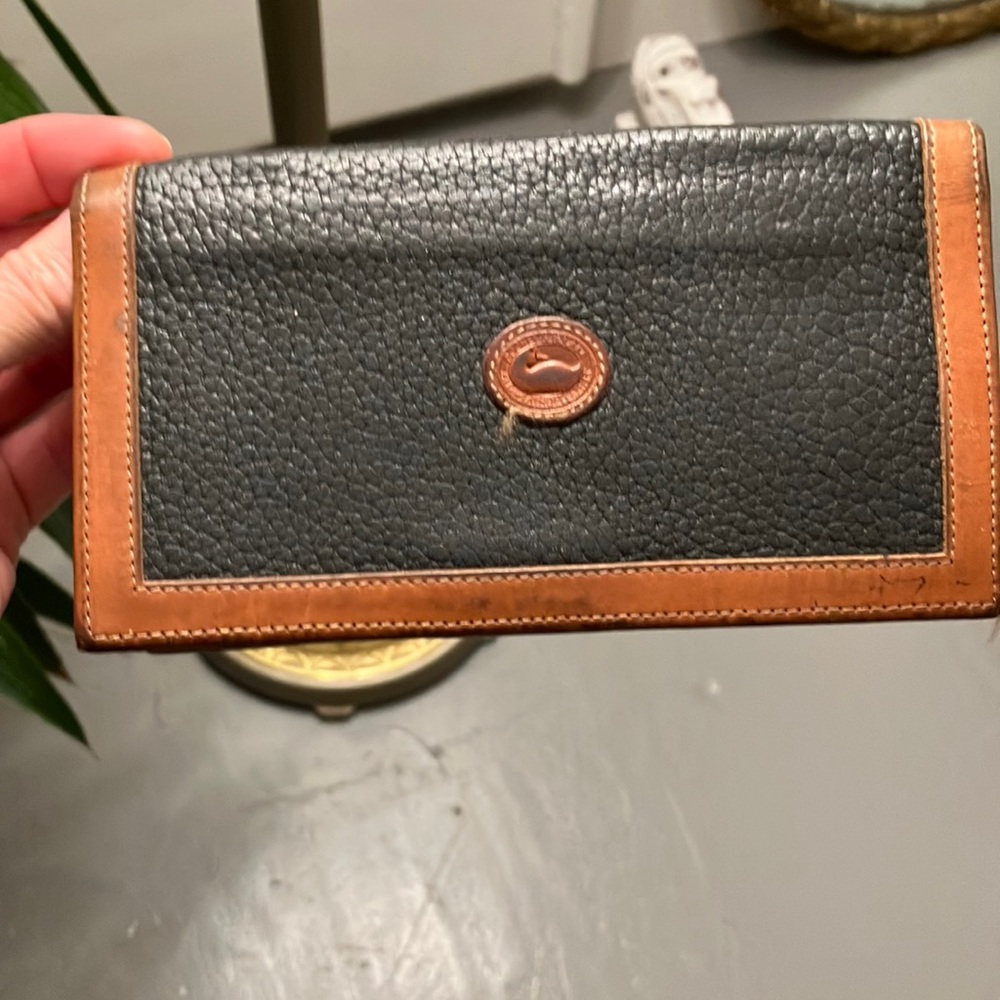 Vintage Dooney and Bourke check book.  Great condition black leather w brown